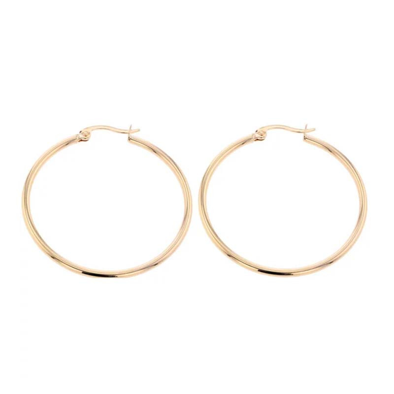 Les boucles d'oreilles Sully Rondes sont des créoles lisses en plaqué or